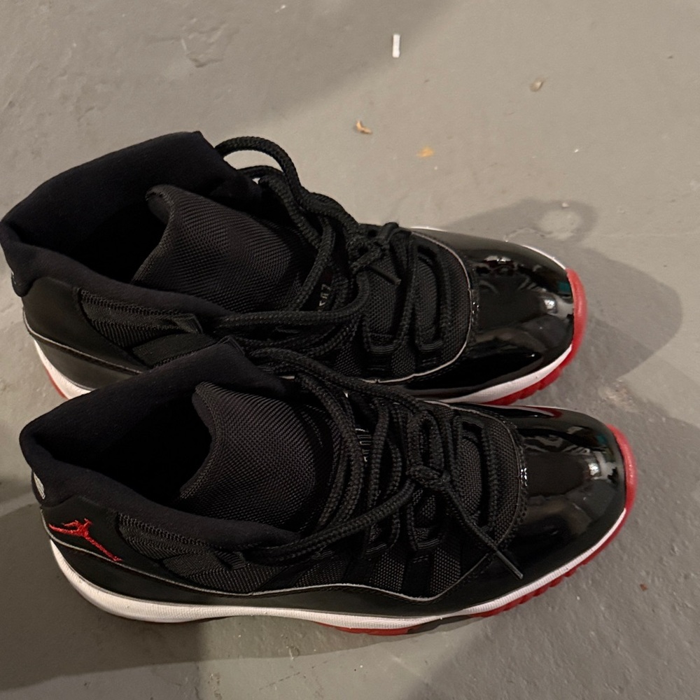 Jordan 11 Black and Red Athletic Sneakers